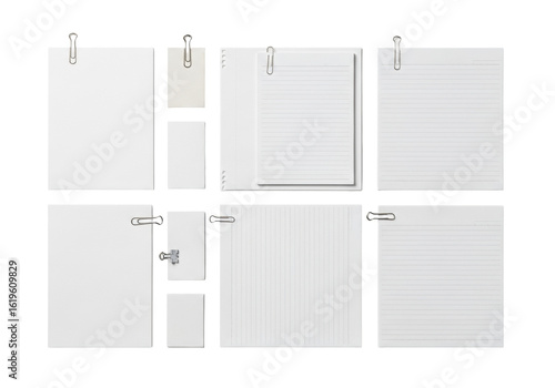 A meticulously arranged collage of various paper sheets, some flat, some creased, some ruled, with silver paper clips, against a transparent background from a flat lay top-down perspective. Concept of