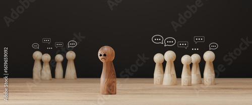Photography Sad wooden figure excluded from group