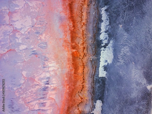 Aerial view of colorful abstract pattern of Tuz Salt Lake in Turkey