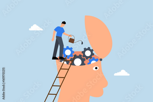 Brain maintenance, man climbs ladder to repair and lubricate teeth of the gears at the brain end.