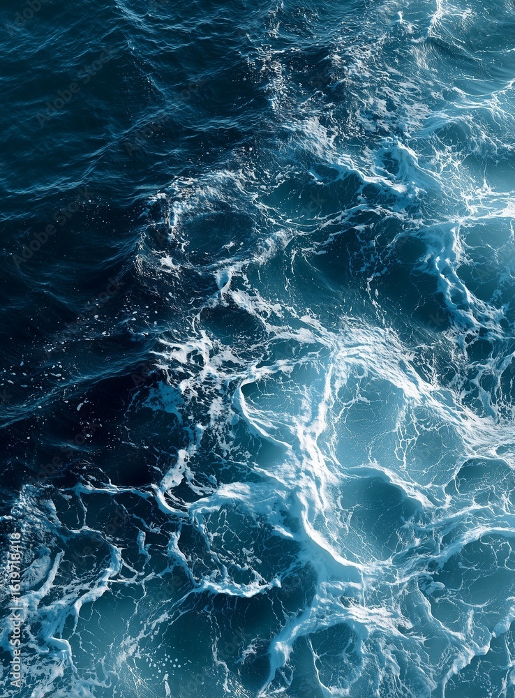 Fototapeta premium Close-up top view of hyper-realistic ocean water surface with gentle blue and white waves creating detailed fluid texture, capturing the essence of natural movement and clarity in high resolution