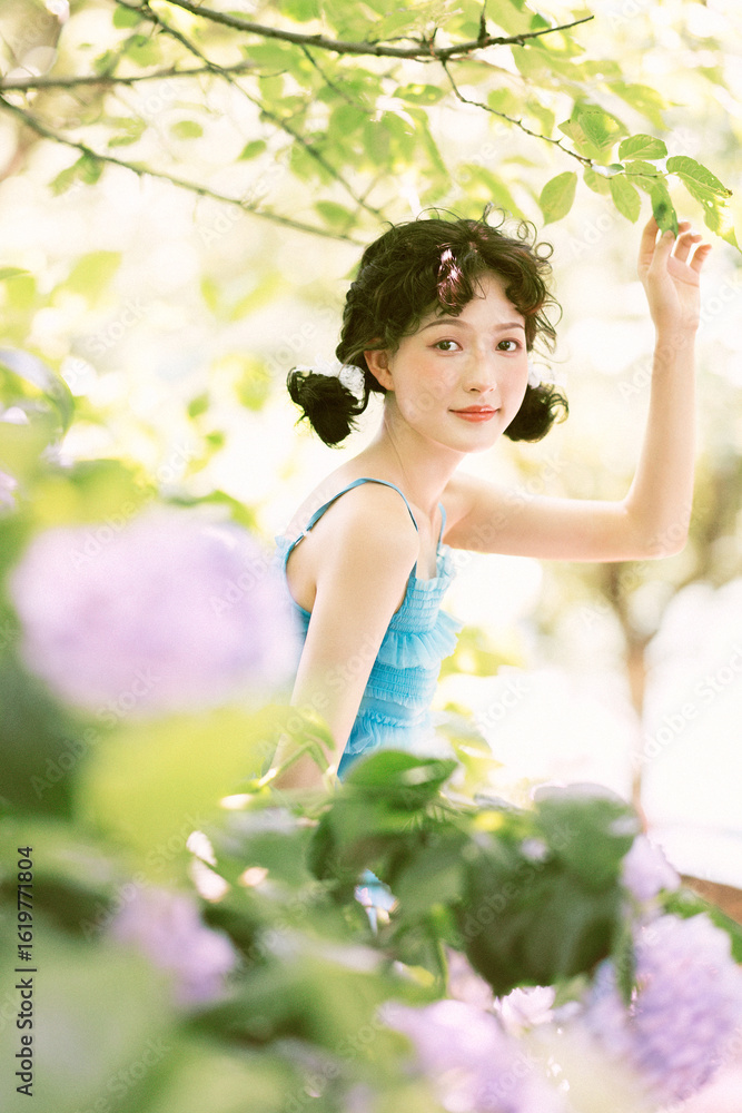 Young woman enjoying a serene moment in nature. Young woman enjoying a serene moment in nature.