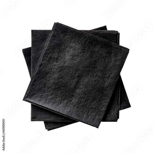 Elegant stacked black paper napkins on dark background for sophisticated events isolated on transparent background, png