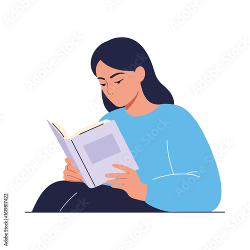 Girl reading book with concentrated expression, seated and engrossed. Enjoyable girl reading book in casual blue attire, absorbing knowledge from pages.