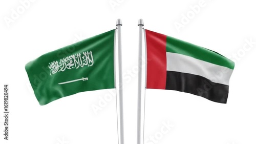 Flags of Saudi Arabia and the United Arab Emirates wave side-by-side. The Saudi Arabian flag is green with Arabic script and a sword, while the UAE flag is red, white, and black.

