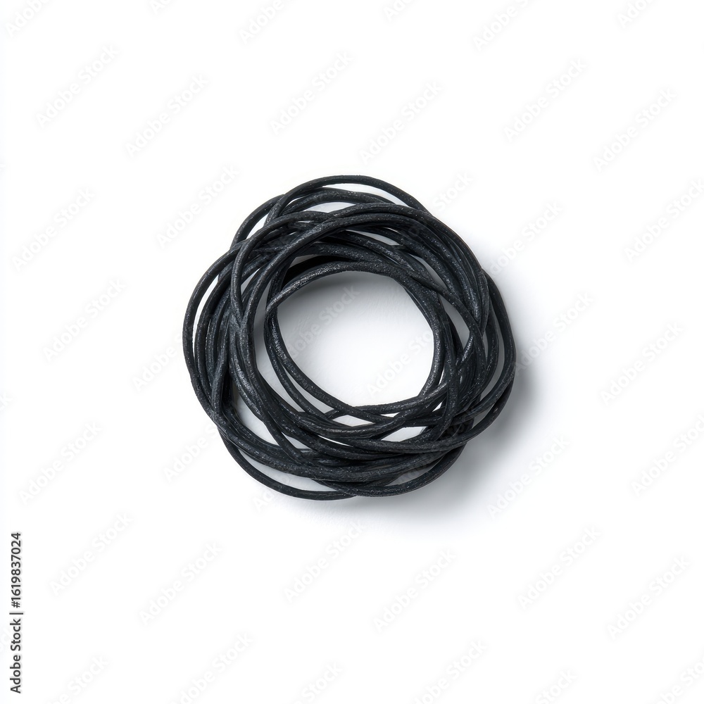 Close-up of black rubber bands, clustered Close-up of black rubber bands, clustered