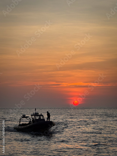 magical beautiful sunset on the beach. the sun dives into the golden waves. incredible sea landscape. Seascape, Summer and travel vacation concept