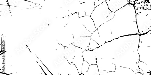 Cracked wall texture in high contrast black and white, perfect for grunge backgrounds, decay effects, or aged urban design references.
