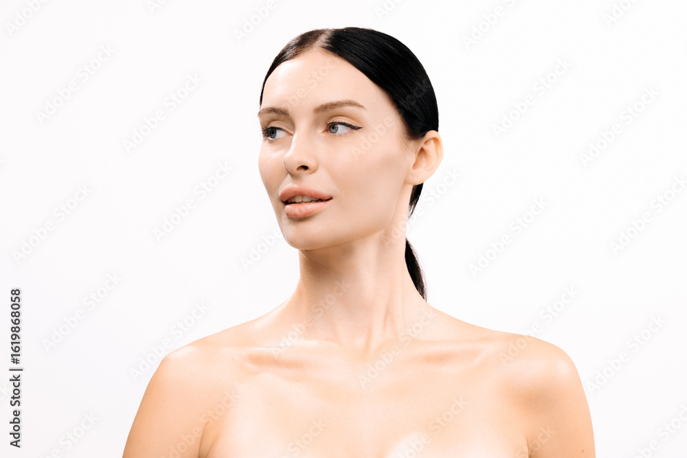 Beautiful woman with clear skin and sleek black hair, poses gracefully against a white background, showcasing natural beauty and radiance, perfect for beauty and skincare themes Beautiful woman with clear skin and sleek black hair, poses gracefully against a white background, showcasing natural beauty and radiance, perfect for beauty and skincare themes