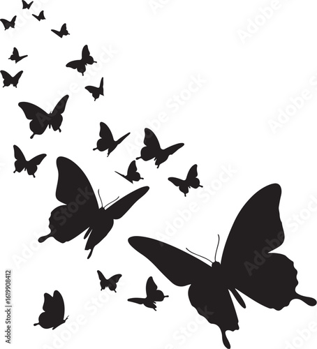 Black butterflies flying in a group nature