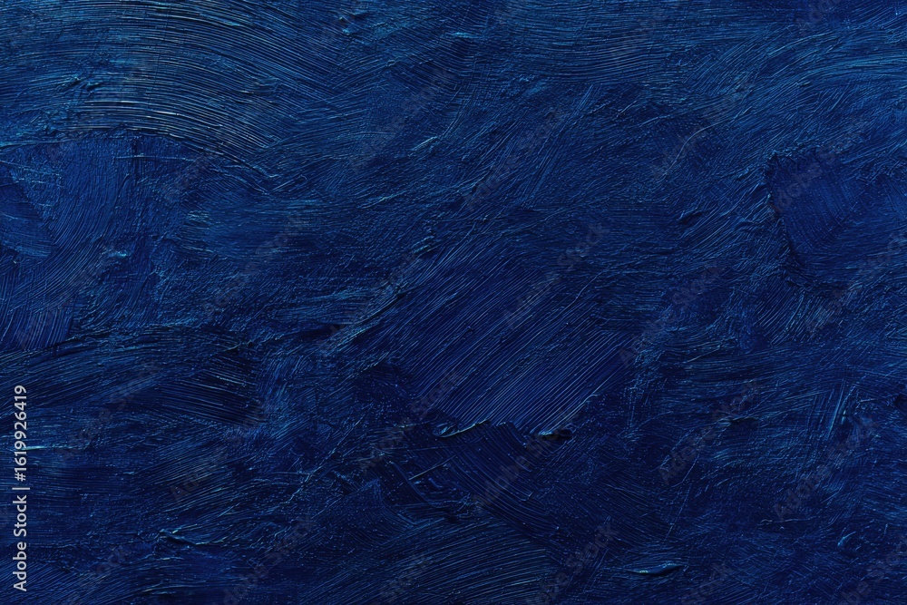 Obraz premium Deep blue textured surface with visible brushstrokes
