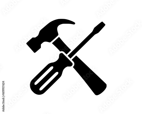 Hammer and screwdriver crossed silhouette icon