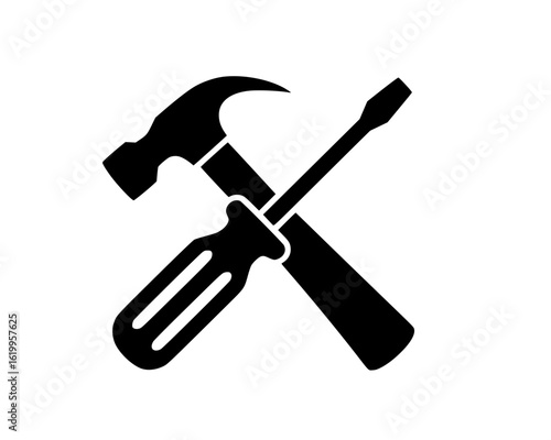 Hammer and screwdriver crossed silhouette icon