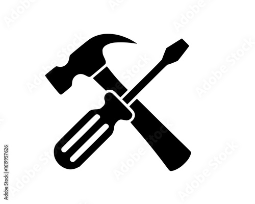 Hammer and screwdriver crossed silhouette icon