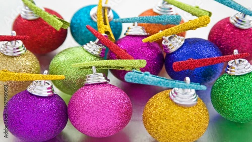 Bright and colourful baubles against a white background