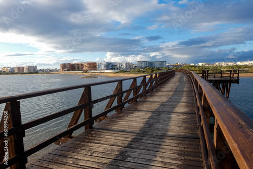 Wooden footbridge crossing In Huelva, Isla Cristina, Spain