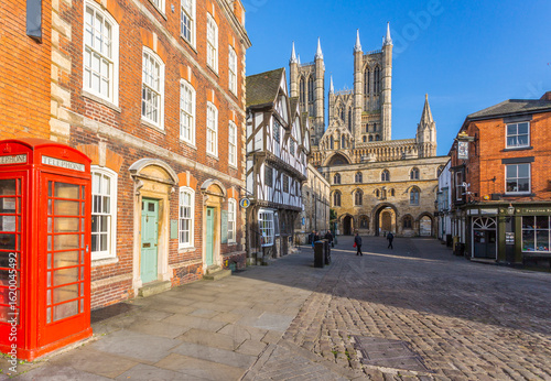 Lincoln Cathedral viewed from Exchequer Gate with red telephone visible, Lincoln, Lincolnshire, England