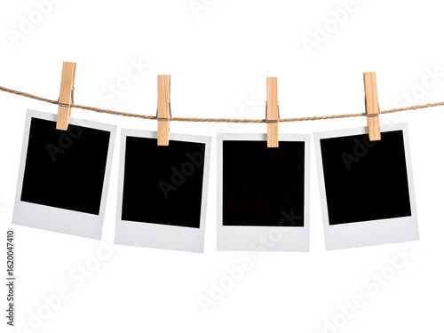 Blank polaroid frames hung up by wooden clothespins, suitable for showcasing memories, creating a photo collage, or adding text overlays.