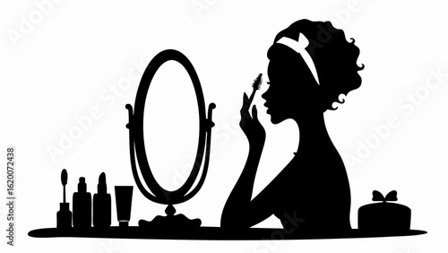 Silhouette of woman applying mascara at vanity table with mirror and beauty products in black and white