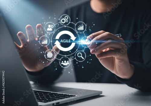 Person interacting with digital agile methodology flowchart on laptop screen hand technology