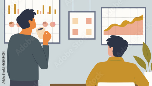 Two colleagues analyzing data charts in an office setting with a potted plant and coffee cup