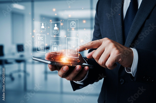 A Businessman Guide to KYC and Digital Approval. A businessman using smart technology to verify digital identity, KYC documents, and approve online profiles, representing secure authentication.