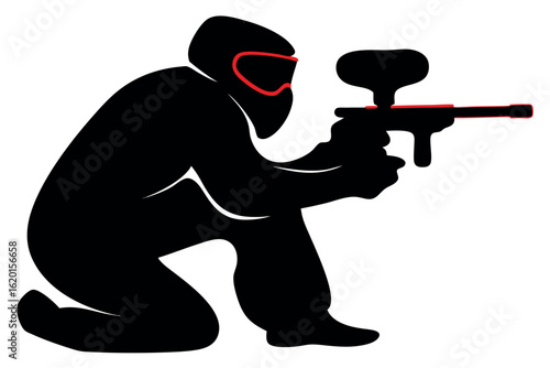 Kneeling player in black silhouette with red goggles and holding a paintball marker