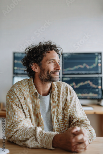 man sitting on sofa with laptop