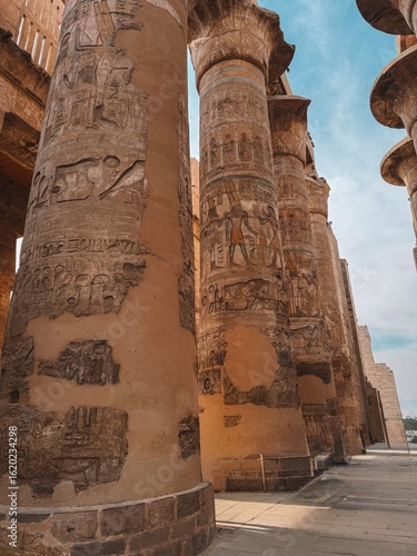 Massive engraved pillars of Karnak Temple, Luxor, Egypt