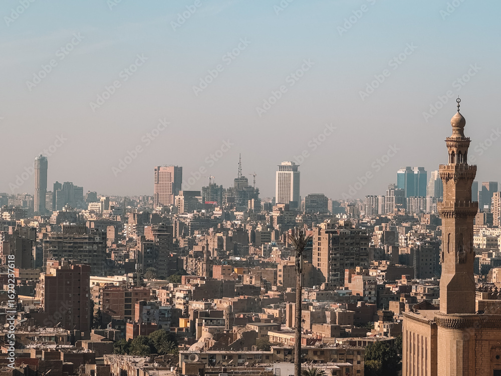 Fototapeta premium Cairo skyline at noon with haze and warm tones