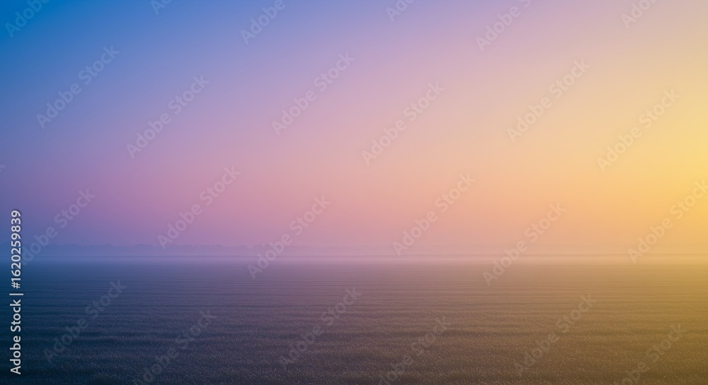Fototapeta premium Misty Sunrise Over Lavender Fields: Serene Pastel Landscape Photography