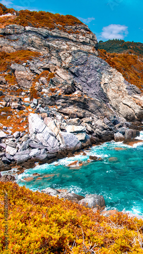 Idyllic summer day along the stunning coastline of Skopelos, Greece