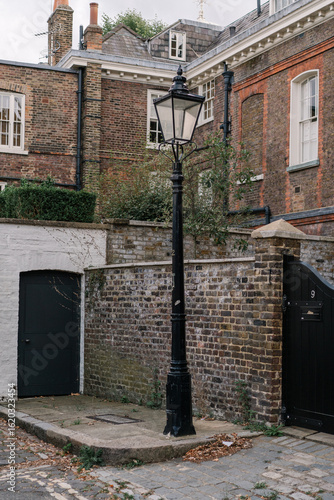 Photography narrow street in the old village, vintage lamppost, Hampstead, London