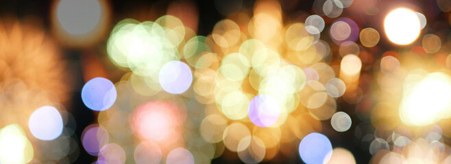 Banner Blurred background Gold Firework celebrate anniversary. Blurry gold firework night celebrate national holiday Design Element with copy space. Happy new year 2025, 4th of july holiday festival