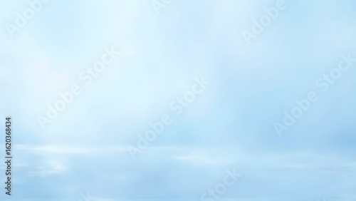 A blue sky with faint white clouds