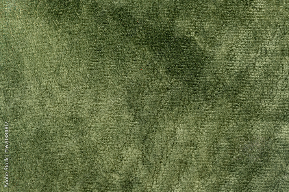 Fototapeta premium Green colored fabric with crackled suede leather texture
