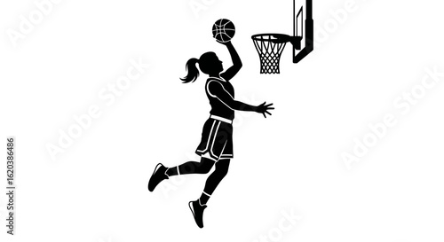 Athletic Young Man Leaping to Dunk Basketball in Hoop