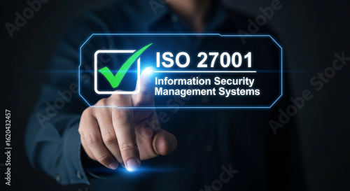 Person touching a digital screen displaying iso 27001 information security management systems certification