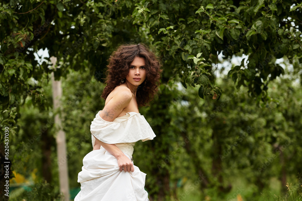 Beautiful young woman enjoying a sunny day in a green park with vintage vibes Beautiful young woman enjoying a sunny day in a green park with vintage vibes