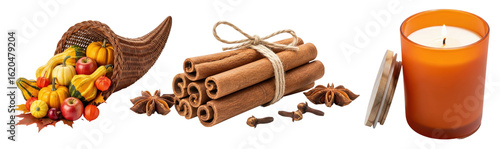 Cornucopia with fall harvest, bundle of cinnamon sticks and star anise, and an orange scented candle