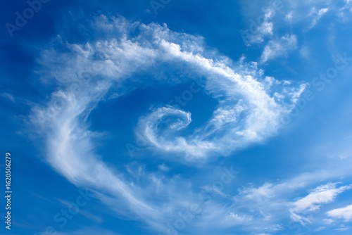Wallpaper Mural A stunning swirl of clouds painted against a clear bright blue sky backdrop Torontodigital.ca