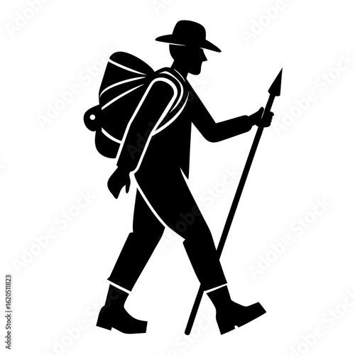 Hiker with backpack and staff walking silhouette