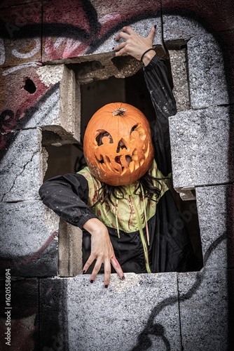 Wallpaper Mural Halloween Pumpkin Head Girl in Urban Graffiti Scene with a red balloon. Torontodigital.ca