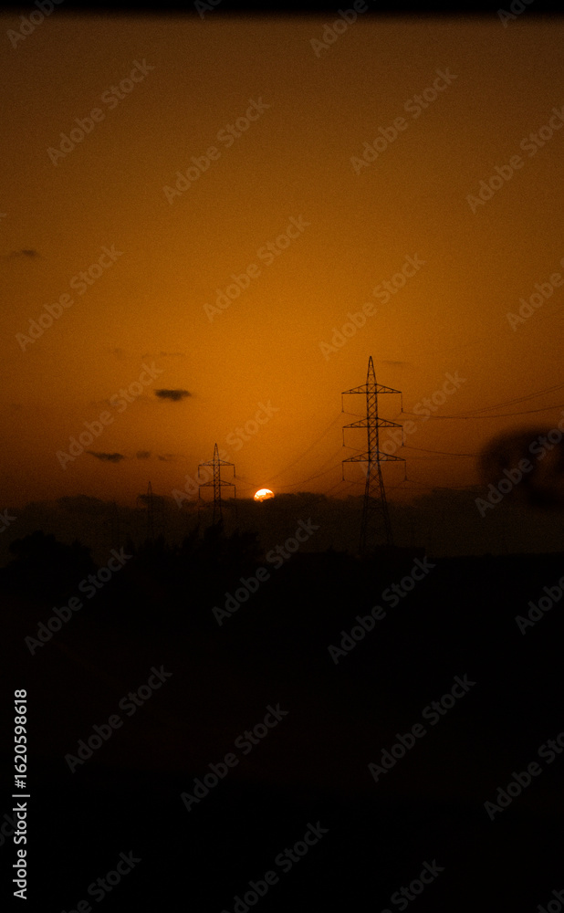 Fototapeta premium power lines at sunset
