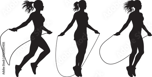 Three women jumping rope in silhouette