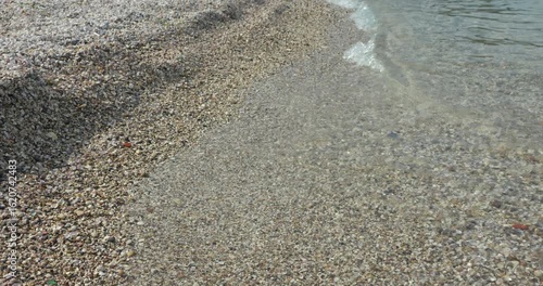 Tranquil Pebble Shore of Clear Lake – Vertical Video
