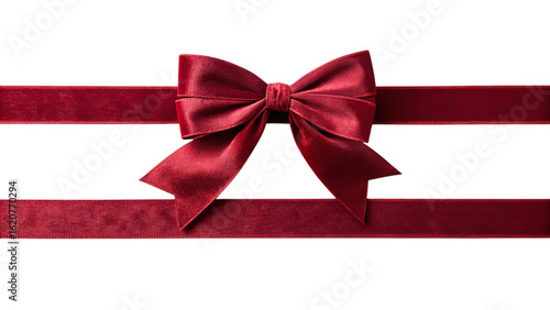Elegant red satin ribbon bow against a stark black backdrop for luxury gifting and special events