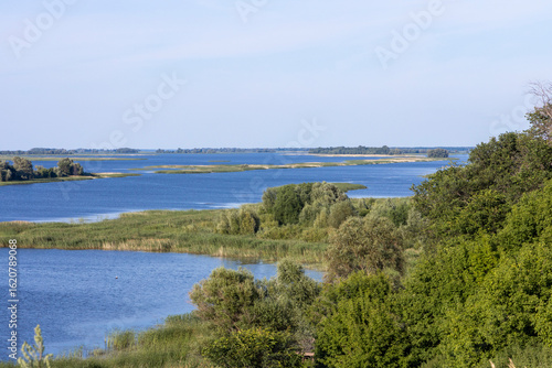 Wallpaper Mural Russian landscape with Volga river on a sunny day. Bolgar, Tatarstan, Russia. View on the valley of Volga river from the hill. Peaceful nature. Beautiful background. Torontodigital.ca