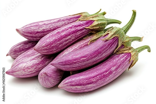 Wallpaper Mural A group of plump purple eggplants on the vine isolated against a white background Torontodigital.ca