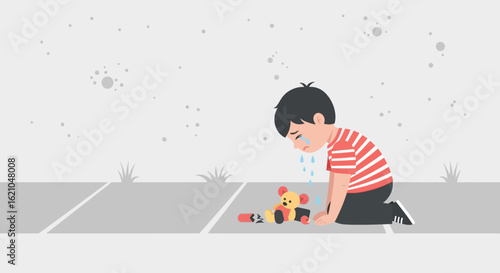 Upset Young Boy Kneeling Beside Torn Toy After An Unfortunate Incident